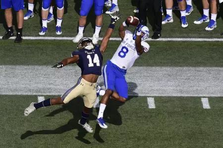 Air Force Falcons wide receiver Marcus Bennett (8) catches a pass over Navy Midshipmen cornerback Elijah Merchant (14) during the first quarter at Navy-Marine Corps Memorial Stadium. Tommy Gilligan-USA TODAY Sport