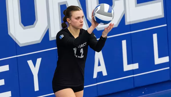 Mia Loyd serves a ball during the Falcons' 2025 match with Wyoming.