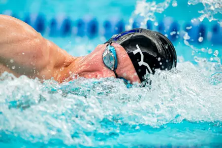Joe Christ swims freestyle