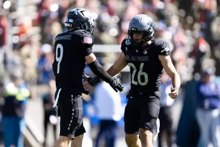 Alexander Perez and Max Mustell celebrate vs. Navy