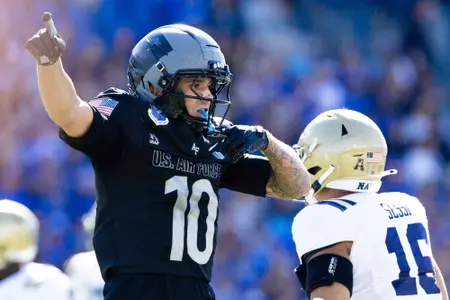 Adam Hrynciw celebrates vs. Navy