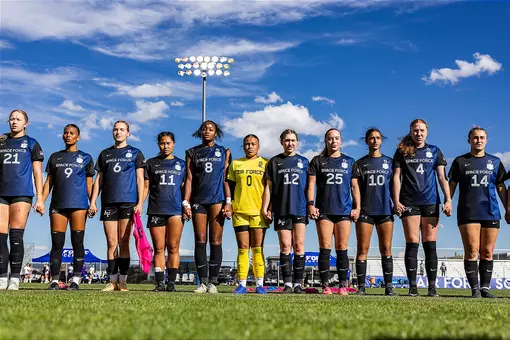 The women's soccer team sings the Third Verse after beating Grand Canyon at home
