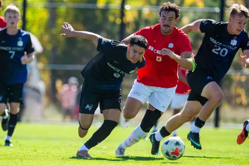 Hector Orozco battles for the possession against UNLV at Cadet Soccer Stadium