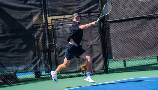 Alec Fritzinger returns a shot against North Dakota.