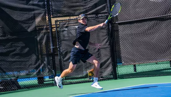 Alec Fritzinger returns a shot against North Dakota.