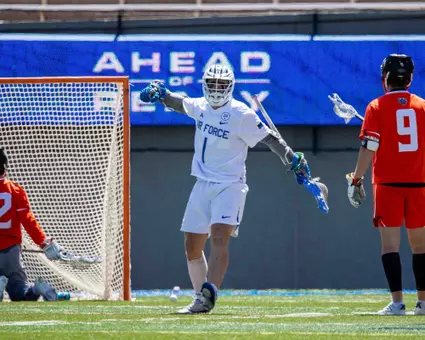 Caelan Driggs celebrates his all-time goals record in the Senior Day matchup against Mercer.