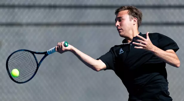 Langdon Tingleaf returns a shot against North Dakota