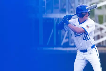 Kayden Bradshaw readies at the plate to take a pitch.