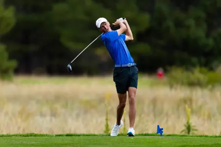 Carson Baker hits an iron at the Gene Miranda Falcon Invitational