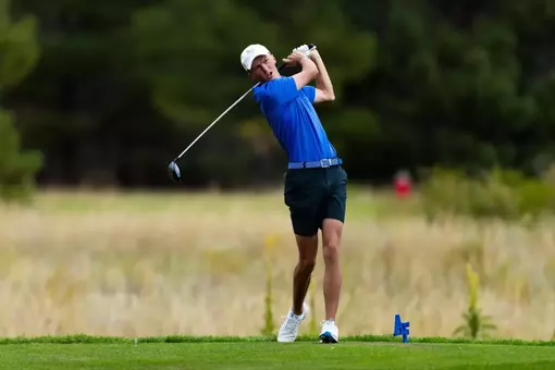 Carson Baker hits an iron at the Gene Miranda Falcon Invitational