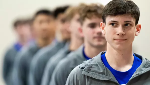 Ryan Jacobsen led the Falcons out during team introductions at the 2026 USAG Collegiate Nationals.