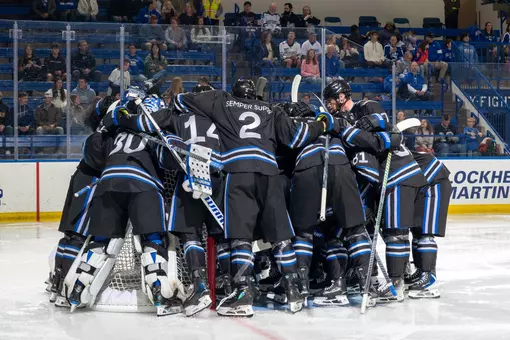 Team pre-game huddle vs. St. Thomas
