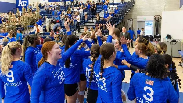 The volleyball team huddled up during their 2025 match against Nevada.