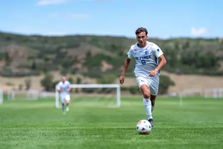 Oliver Becker dribbles the ball down the pitch at USAFA