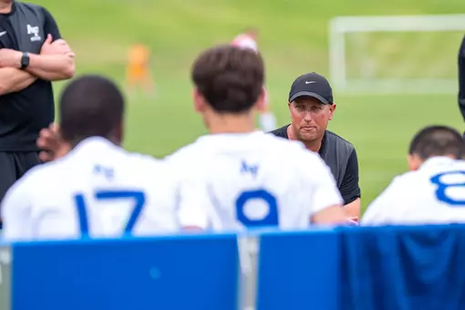 Greg Dalby coaches from the sideline
