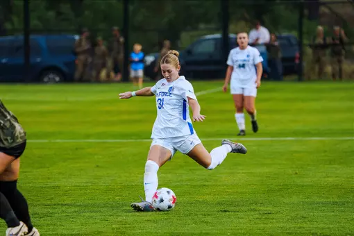 Ellie McCarron prepares to strike the ball against Army
