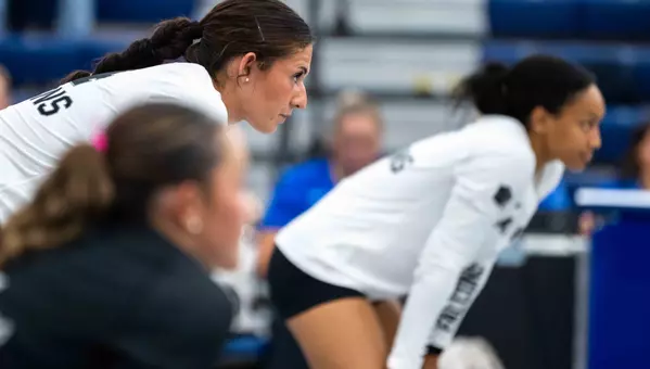 Annamaria Ramos gets ready for a play in the exhibition match against Mines.