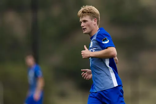 Sean Odle gives the thumbs up as he runs up the pitch