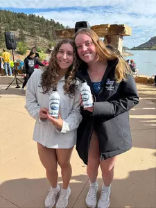 Natalie Doig and Abby Miller accept their podium awards at the Horsetooth Open