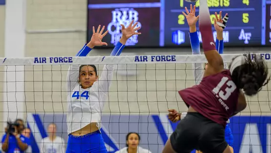 Grace Fiaseu makes a block against Little Rock at the Amy Svoboda Memorial Classic.