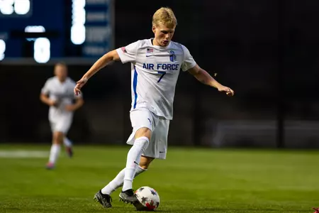 Sean Odle dribbles the ball up the pitch at Cadet Soccer Stadium