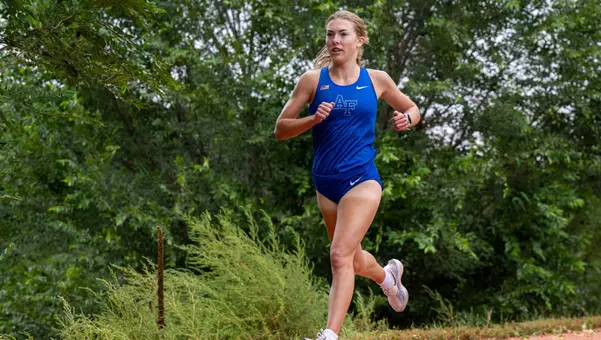 Ella Johnson won the women's three-mile race at the AFXC Classic in 2025.