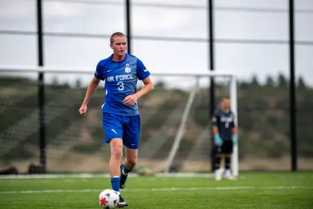 Doran Farrell takes the ball up the field in stride