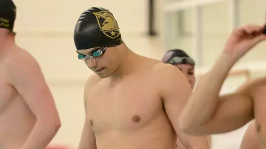 Men's Swim & Dive Moves up at League Championships Image