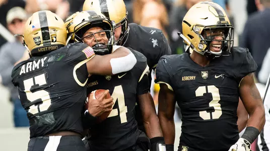 WEST POINT, NY - OCTOBER 20: Cam Thomas #4, Kell Walker #5, and Jordan Asberry #3 of the Army Black celebrate Thomas' touchdown against the Miami of Ohio RedHawks Knights at Michie Stadium on October 20, 2018 in West Point, New York. (Photo by Dustin Satloff/Getty Images) *** Local Caption *** Cam Thomas;Kell Walker;Jordan Asberry