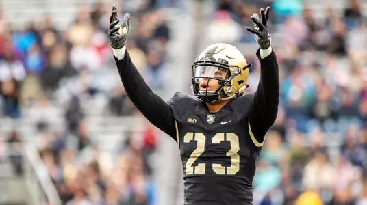 WEST POINT, NY - OCTOBER 20: Elijah Riley #23 of the Army Black Knights pumps up the crowd during a game against the Miami of Ohio RedHawks at Michie Stadium on October 20, 2018 in West Point, New York. (Photo by Dustin Satloff/Getty Images) *** Local Caption *** Elijah Riley
