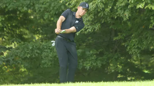 Senior Nick Turner takes a shot during the Army-Navy match at the West Point Golf Course