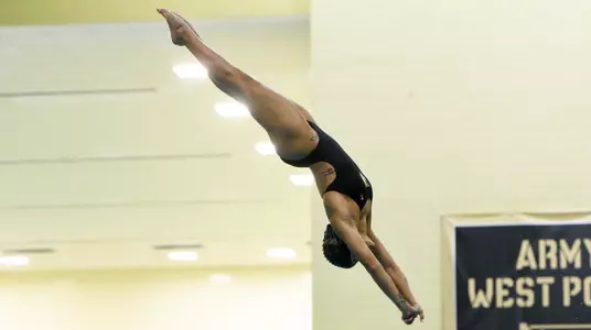 Serica Hallstead dives into the water
