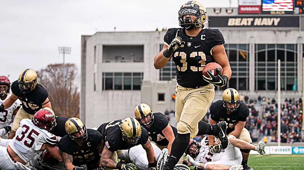 Darnell Woolfolk runs in for the score against Colgate to help Army remain unbeaten at home