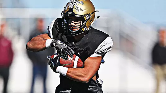Artice Hobbs runs the football during Army's practice in preparation for the 2018 Lockheed Martin Armed Forces Bowl