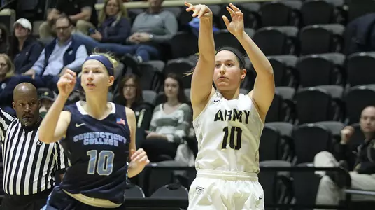 Sarah Bohn makes one of her three 3-pointers on the day against Connecticut College in a 74-48 win.