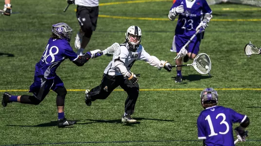 AJ Barretto (4) of Army, Rowan Hart (48) of Holy Cross
Army Black Knights vs. Holy Cross Crusaders
NCAA Division I Men's Lacrosse
Michie Stadium - West Point, NY
March 17, 2018