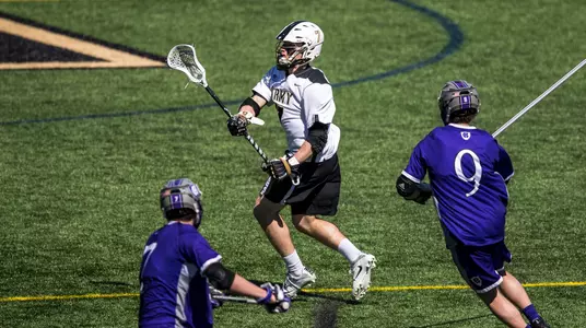 Connor DeWitt (7) of Army and Will Murphy (9) of Holy Cross
Army Black Knights vs. Holy Cross Crusaders
NCAA Division I Men's Lacrosse
Michie Stadium - West Point, NY
March 17, 2018