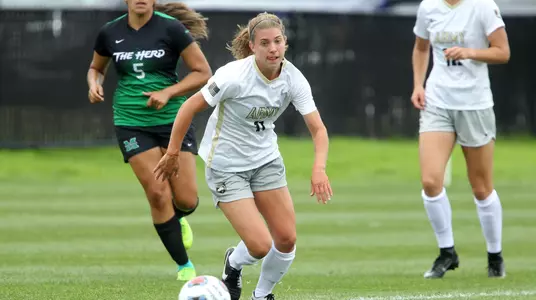Kayleigh Stallings chasing a loose ball vs. Marshall