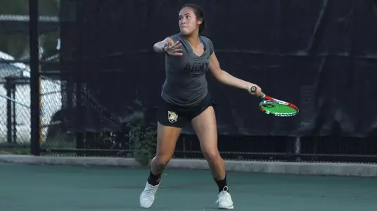 Abi Waldman playing tennis