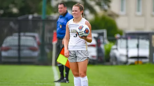 Emily Torres prepares for a throw in vs. Marshall
