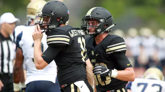 Keegan West and Tom Williamson celebrating vs. Navy