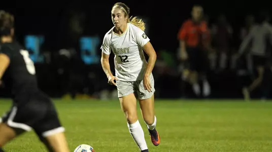 Erynn Johns dribbling toward goal vs. Lafayette