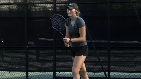 Caroline Vincent playing tennis