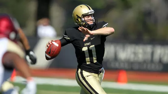 Keegan West throwing one of his five touchdowns against St. Thomas Aquinas