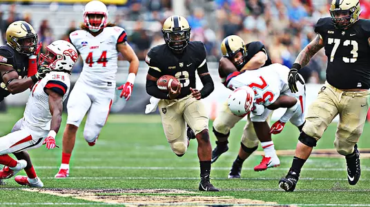 Junior quarterback Kelvin Hopkins Jr. finds a gap and breaks free for big yardage for the Black Knights