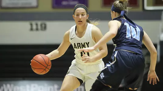 Sarah Bohn makes a move during the game against Connecticut College on Dec. 30, 2018,