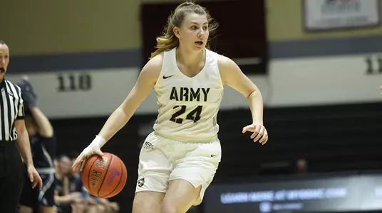 Natalie Stralkus dribbles down the court during Army's win over Connecticut College on Dec. 30, 2018