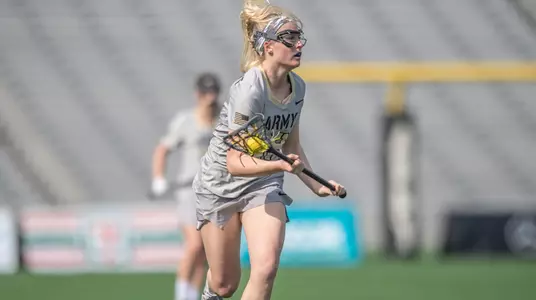 Jackie Brattan looks up the field
