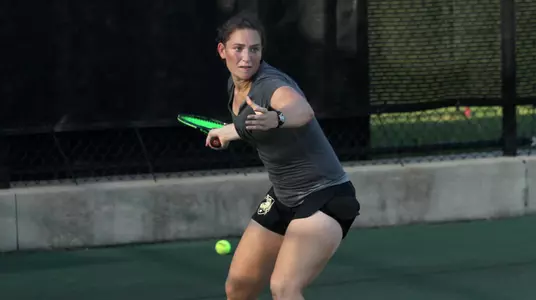 Kirby Einck playing tennis
