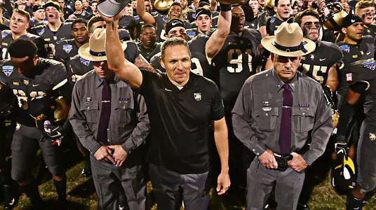 Head football coach Jeff Monken celebrates after Army defeated Houston in the 2018 Lockheed Martin Armed Forces Bowl.